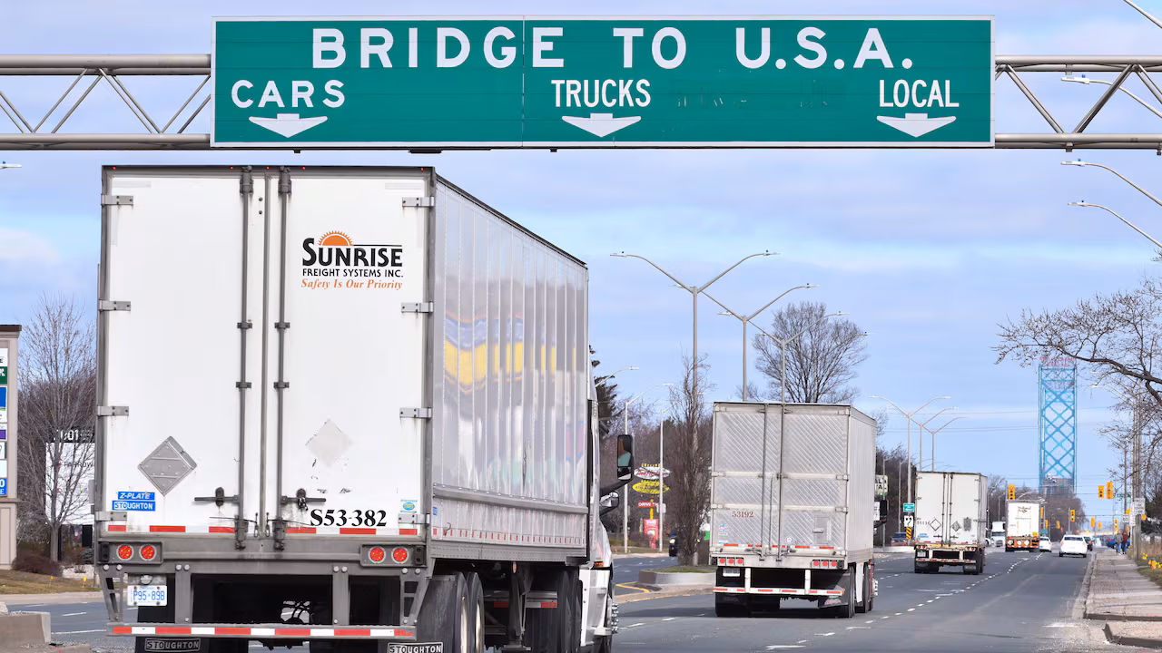 Freight trucks at the Canada US border amid the deepening trade rupture